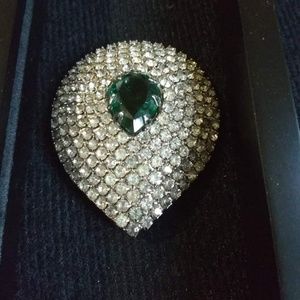 Vintage  rhinestone brooch, with a green emerald .